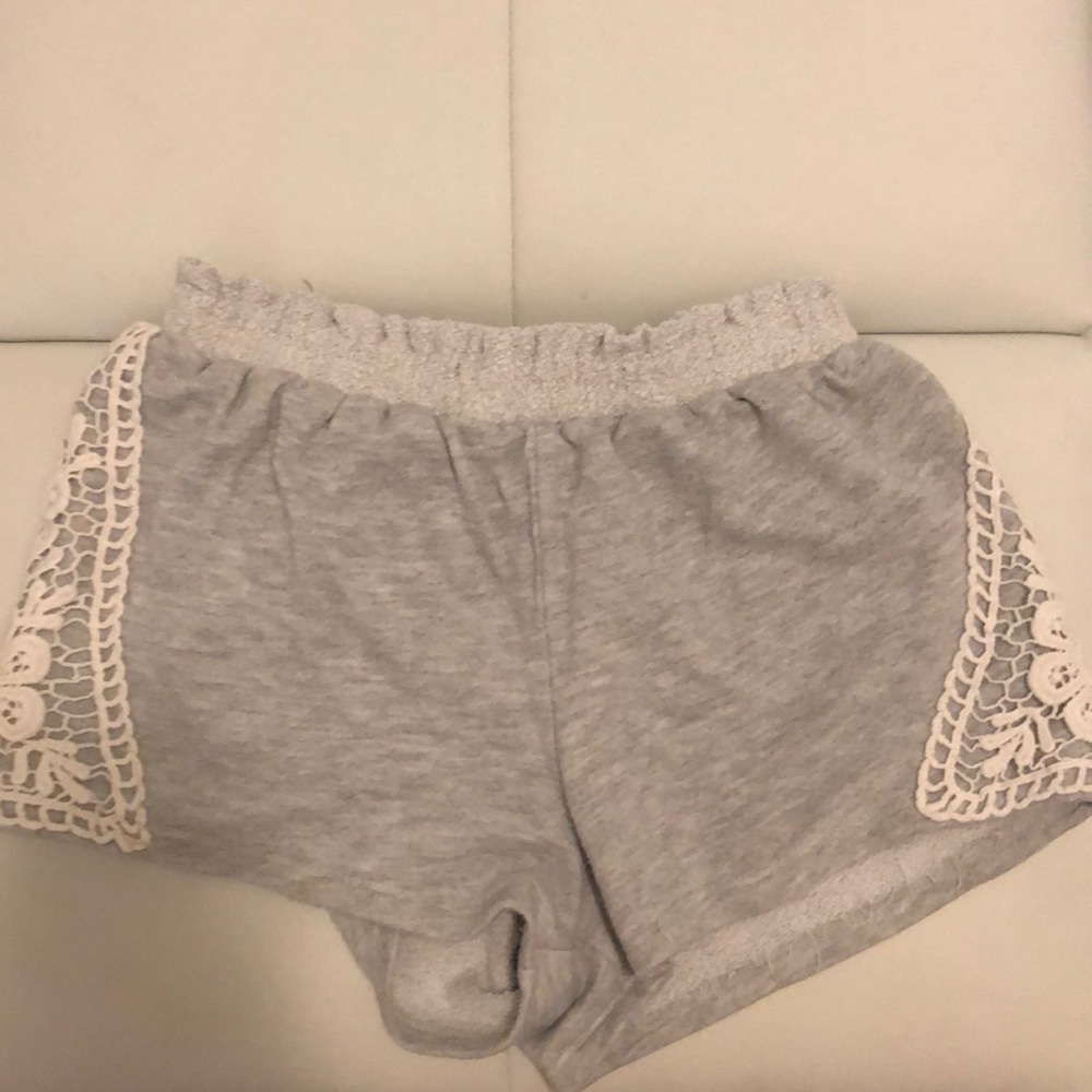 grey shorts with details on sides